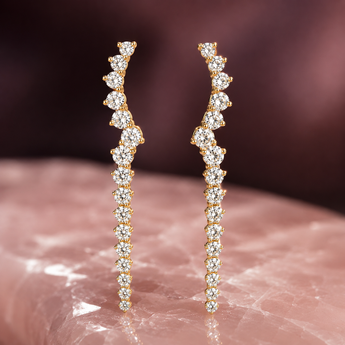 Gold-plated silver long drop earrings with cascading stone-set details