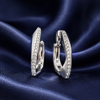 Silver-toned hoop earrings with polished finish and stone-set row