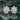 Silver-toned layered floral earrings with stone-set detailing