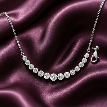 ATJ - 129 silver graduated riviera curve necklace on plum satin