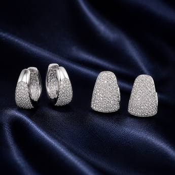 Textured silver earrings with bright stone-set detailing