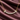 Gold-plated curved smile bar pendant necklace with round stones on plum satin
