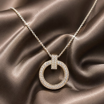 Gold-plated pavé open circle pendant necklace on bronze satin
