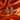 ATJ - 125 yellow gold pavé heart cut-out charm huggie earrings on orange satin